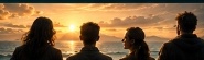 One Creative Cove Team Silhouette against Ocean Sunset